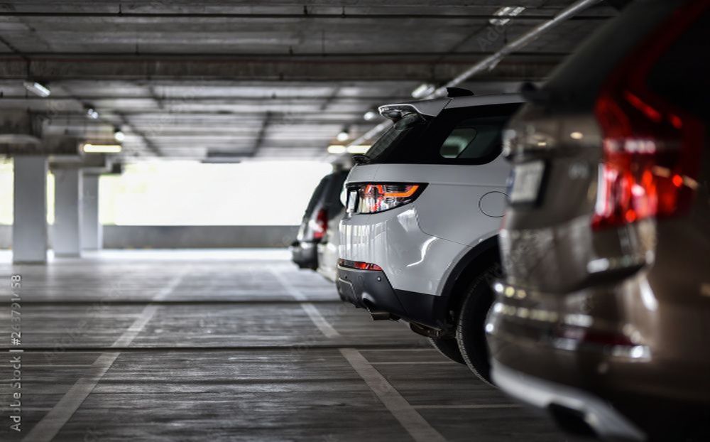 Overdekte parkeerplaats + pendeldienst